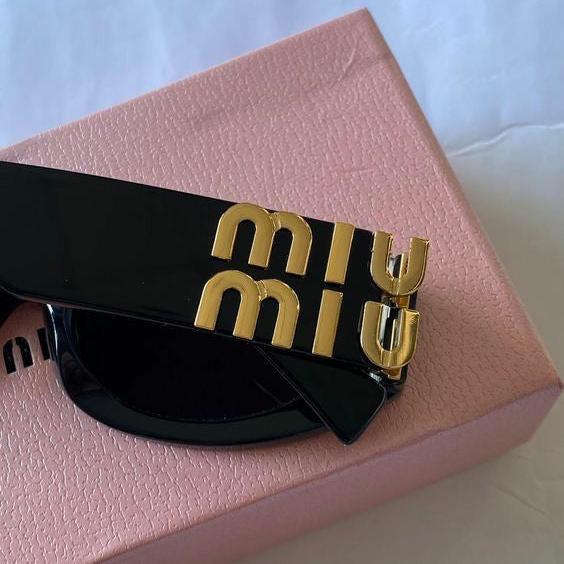 MIU MIU SUNGLASSES